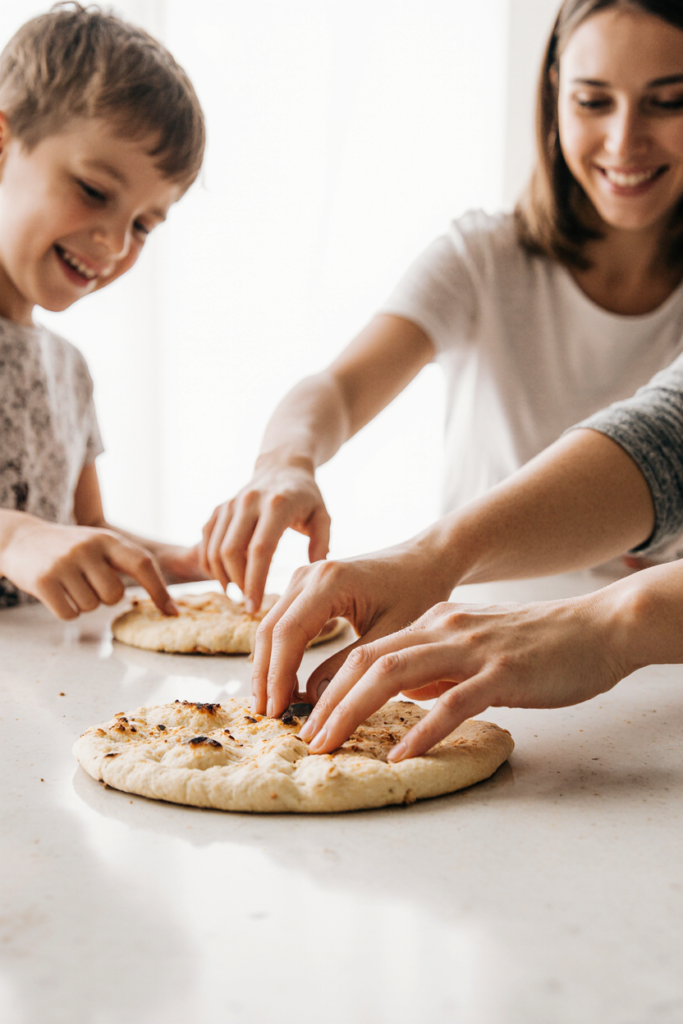 Realistic close-up of mom cutting cottage cheese flatbread with kids reaching in