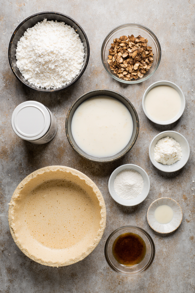 “Ingredients for Old-Fashioned Coconut Cream Pie arranged on a countertop.